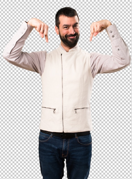 Handsome man with vest pointing down