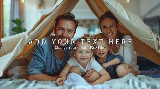 Happy family sitting at home on sofa under symbolic cardboard roof