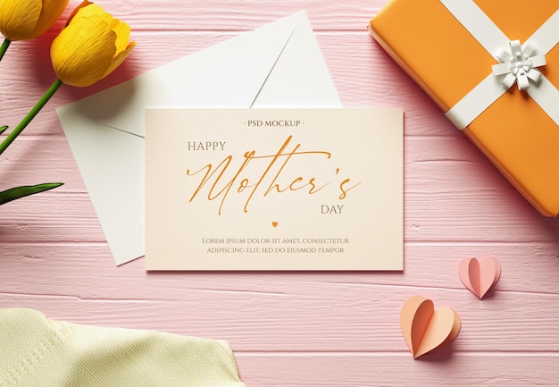 PSD happy mother39s day modern greeting card mockup with envelope flowers and gift on a wooden table