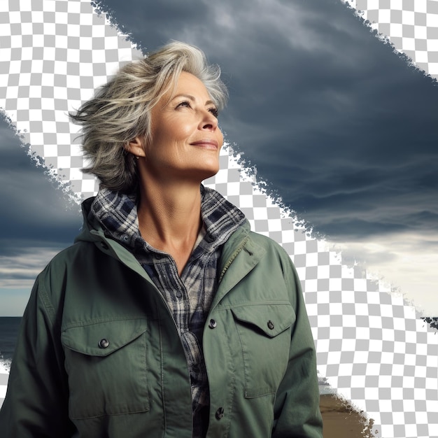 PSD happy and self assured middle aged woman on beach surrounded by stormy sky and ocean with room for text