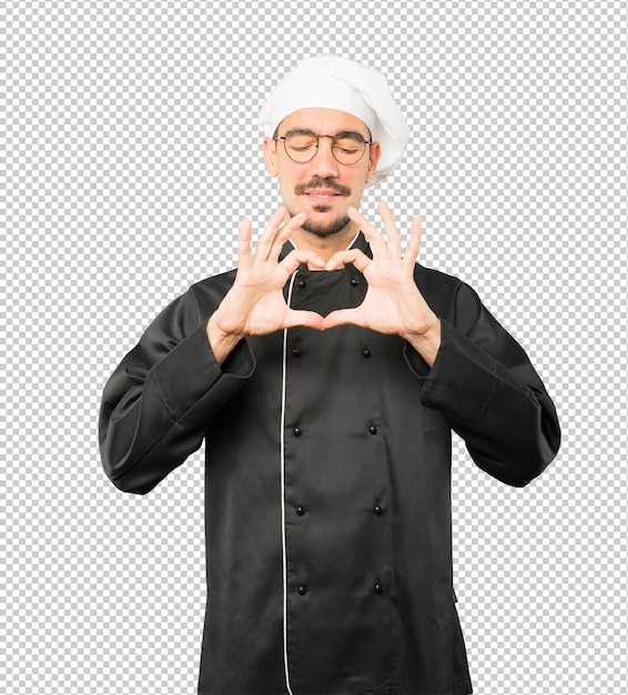 PSD happy young chef doing a gesture of love with his hands