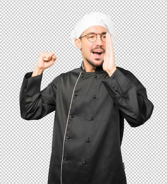 PSD happy young chef trying to say something strongly