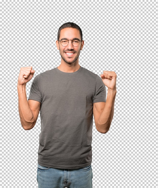 Happy young man doing a competitive gesture