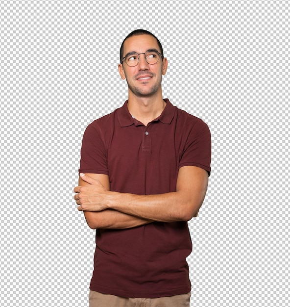 Happy young man looking against background