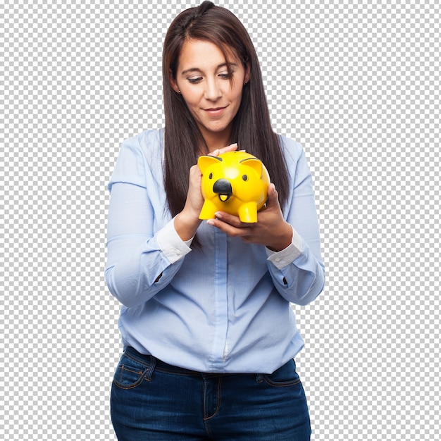 Happy young woman with piggy bank