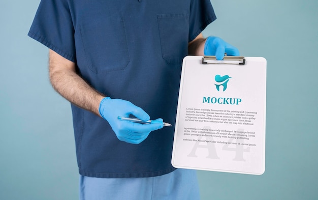 PSD health worker holding mock-up clipboard