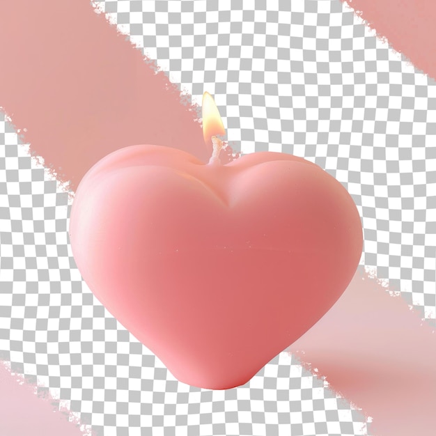 a heart shaped candle is lit up on a pink background