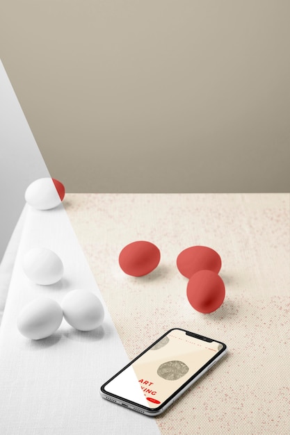 High angle of eggs mock-up with smartphone and copy space