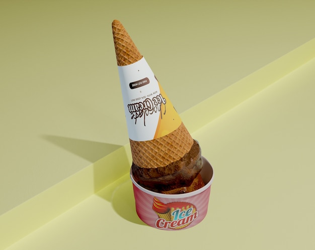 High angle of ice cream cone reversed on container with more ice cream