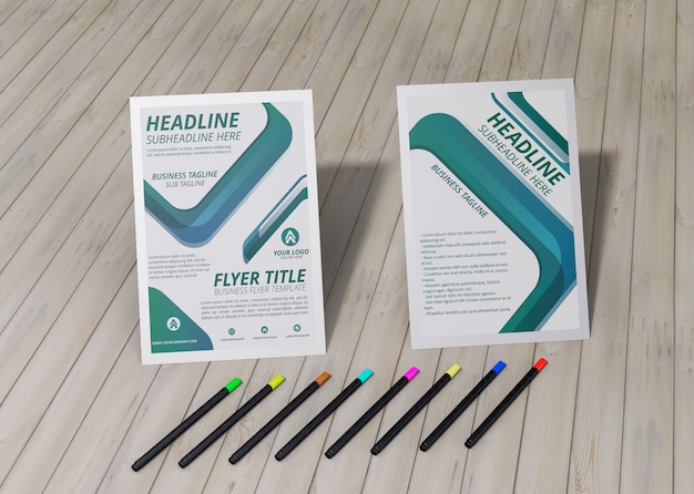 High view flyer and pencils brand company business mock-up paper on wooden backdrop