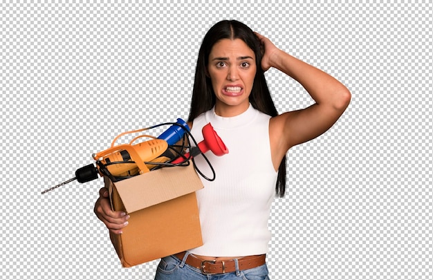 Hispanic pretty young adult and expressive woman housekeeper and toolbox concept