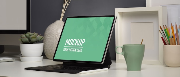 Home office desk with digital tablet mockup