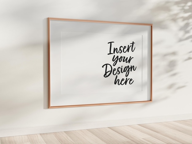 Horizontal golden frame hanging on wall Mockup