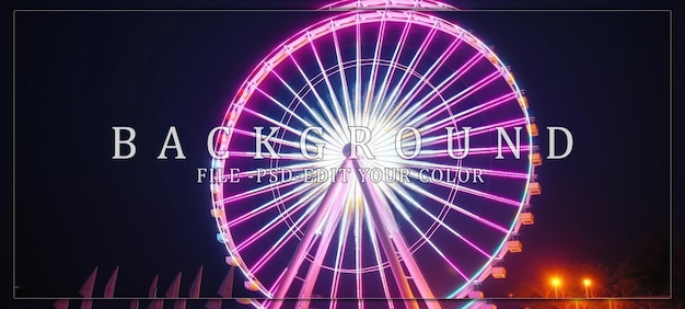 PSD illuminated ferris wheel against night sky