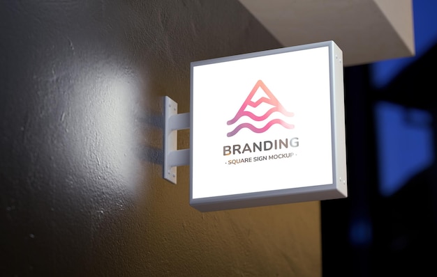 Illuminated wall sign mockup hung on a store facade Street signage template for branding in 3D