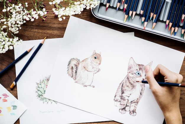 Illustrationist coloring adorable animals workspace concept