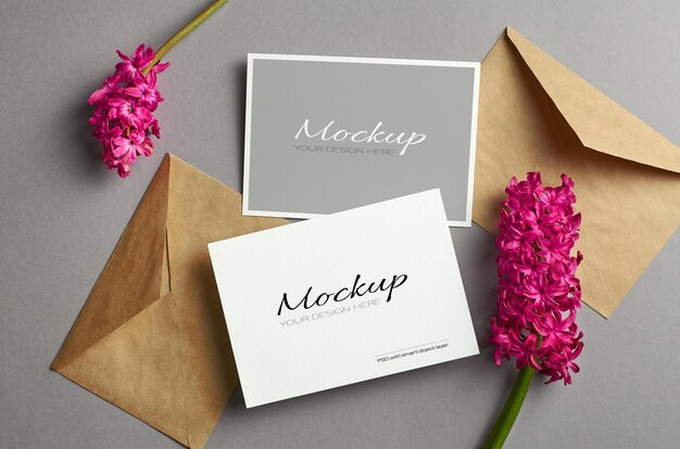 PSD invitation card mockup, front and back sides with envelopes and fresh hyacinth flowers