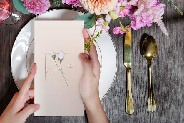 Invitation card mockup on a plate in a reception