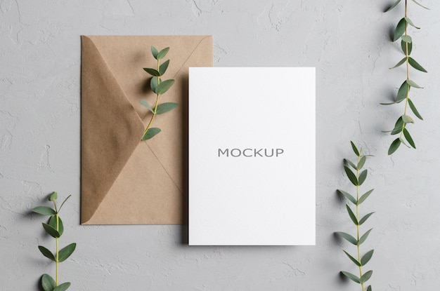 Invitation empty card mockup with envelope and nature plant decorations