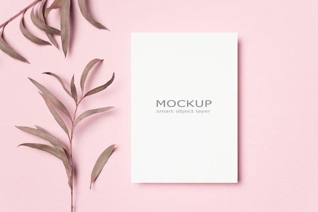 Invitation or greeting card mockup with botanical decor