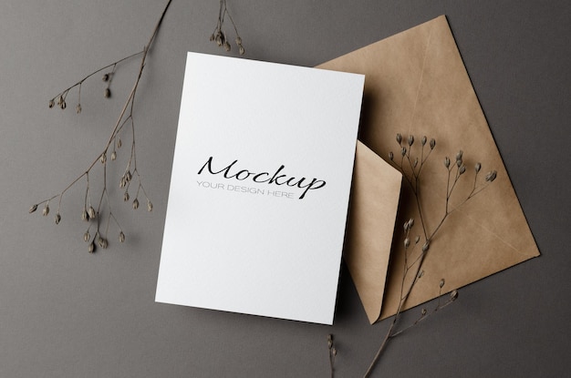 Invitation or greeting card mockup with dry twigs and envelope