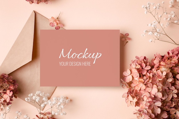 Invitation or greeting card mockup with gypsophila and hydrangea flowers