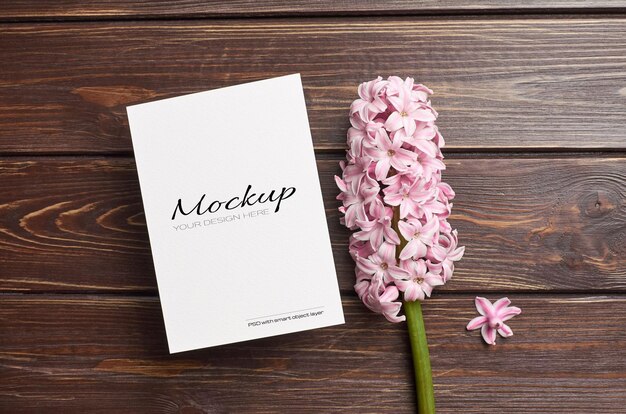 PSD invitation or greeting card mockup with pink hyacinth flower