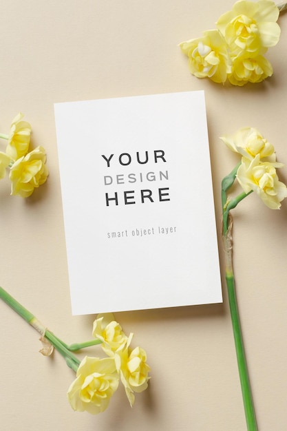 Invitation or greeting card mockup with spring daffodils flowers