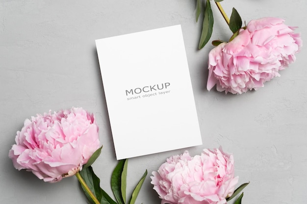 Invitation greeting or flyer card mockup with fresh peony flowers