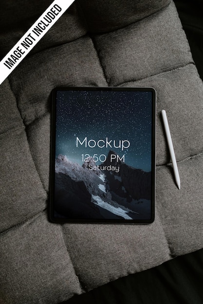 ipad pro on sofa with pen mockup