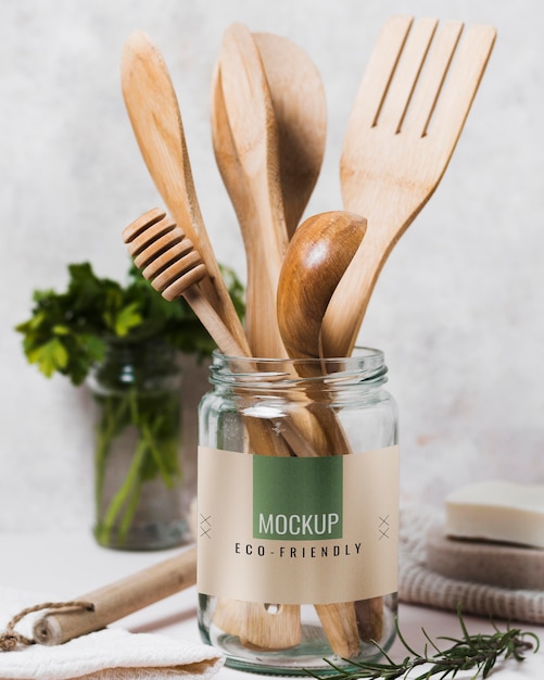 Jars with kitchen tool and ingredients