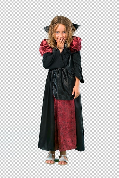 Kid dressed as a vampire at halloween holidays laughing