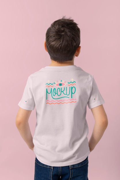 Kid wearing tshirt mockup design