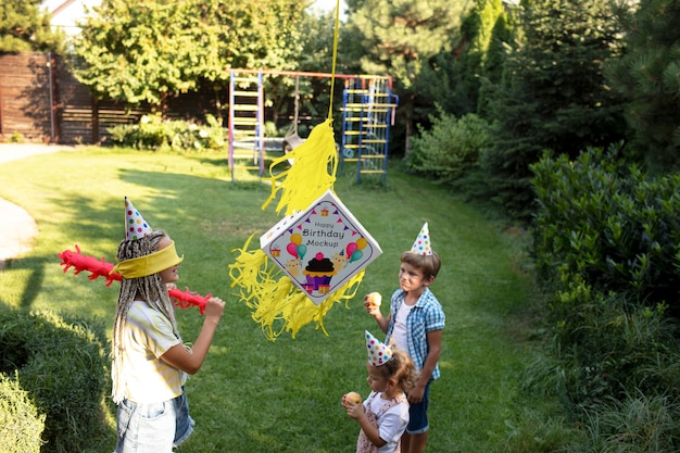 Kids party with pinata mockup