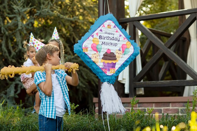 Kids party with pinata mockup