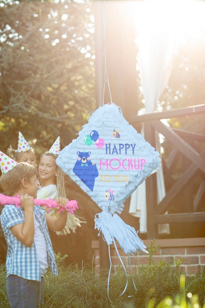 Kids party with pinata mockup