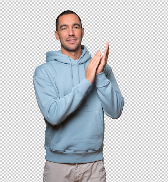 Kind young man doing an applauding gesture