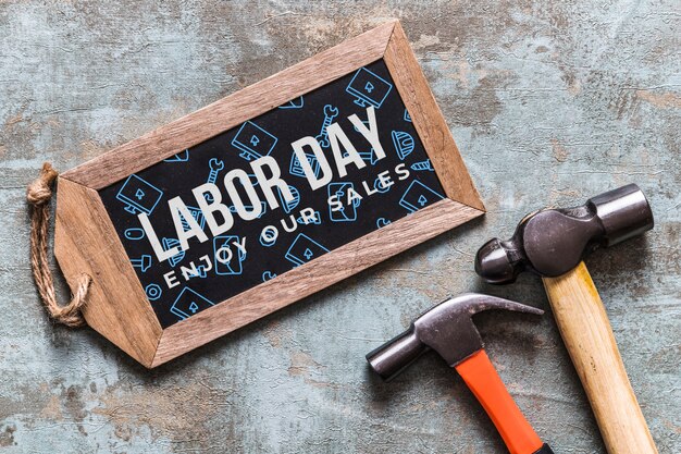 PSD labor day mockup with wooden board and tools