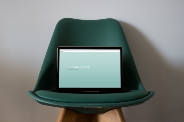 PSD laptop mockup on chair