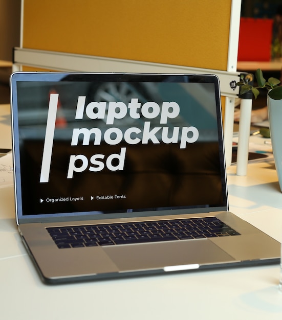 Laptop mockup psd at office