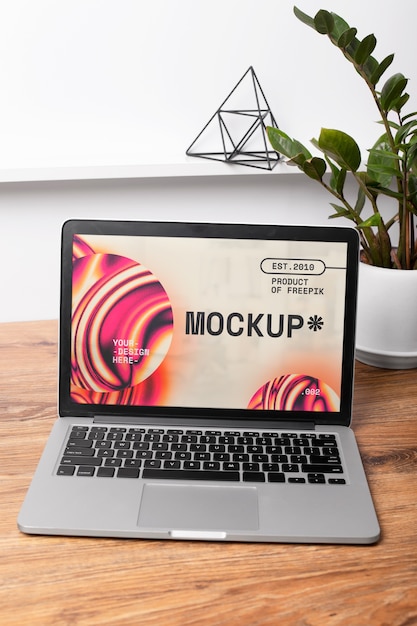 Laptop mockup on table