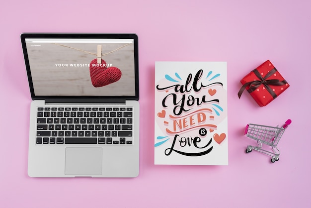 Laptop mockup with valentines day elements