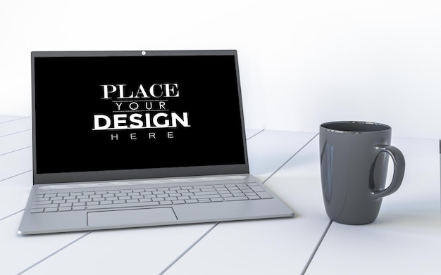 Laptop and mug on desk in workspace mockup