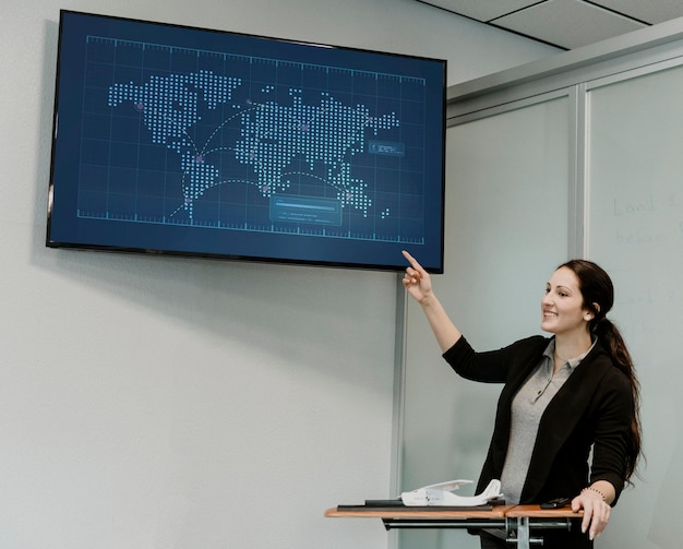 PSD lecturer using a tv screen in the classroom