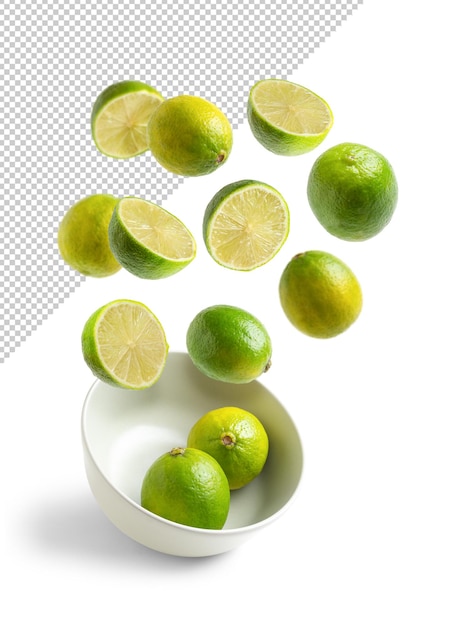 Limes flying in a bowl isolated