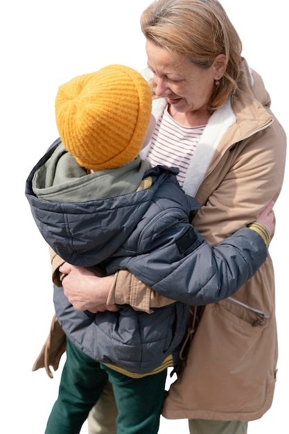 PSD little boy spending time outdoors with his grandmother