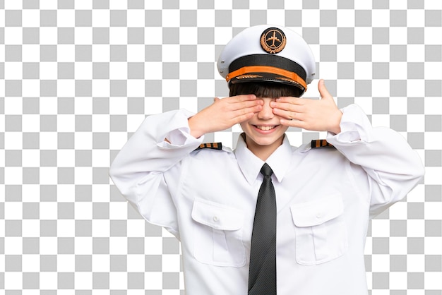 PSD little girl as a airplane pilot over isolated chroma key background covering eyes by hands