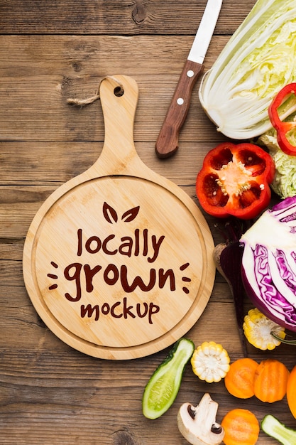 Locally grown veggies mock-up and cutting board