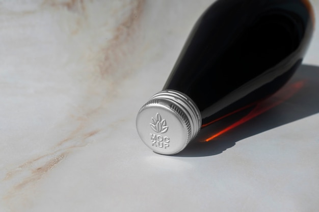 PSD logo on bottle cap mockup