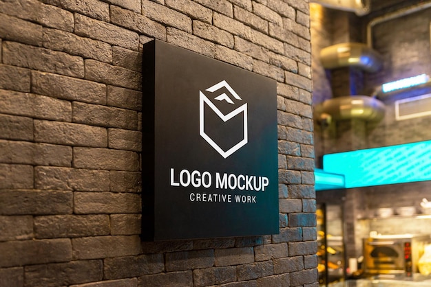 Logo mockup on black signage board